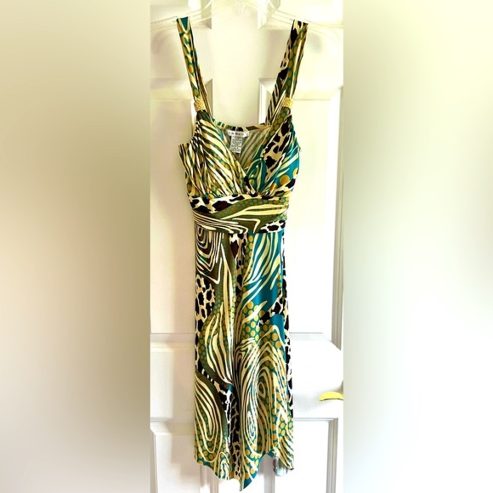 Mid length asymmetrical hem animal print dress